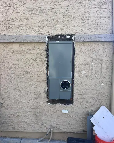The finished panel closed up in the stucco wall
